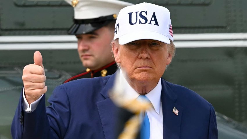 US President Donald Trump gives a thumbs up as he exits Marine One and walks to board Air Force One at Joint Base Andrews, Maryland, on June 6, 2025.